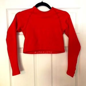 Vibrant red Alphalete compression long sleeve top